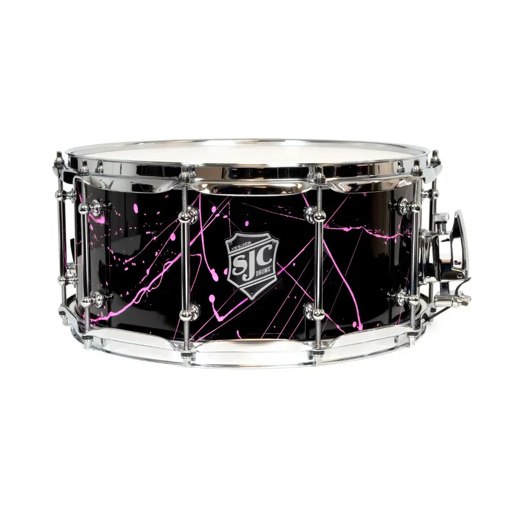 Sjc Custom Drums Navigator Snare Drum - 6.5 Inches X 14 Inches, Black With Pink Splatter 1